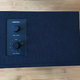 A top-down view of the UrbanEars Stammen multiroom speaker. (Image: Gizmodo / Michael Nunez)The smaller model (shown in black above) is called the Stammen.